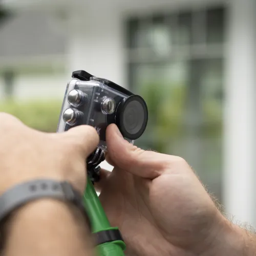 a person holding a camera